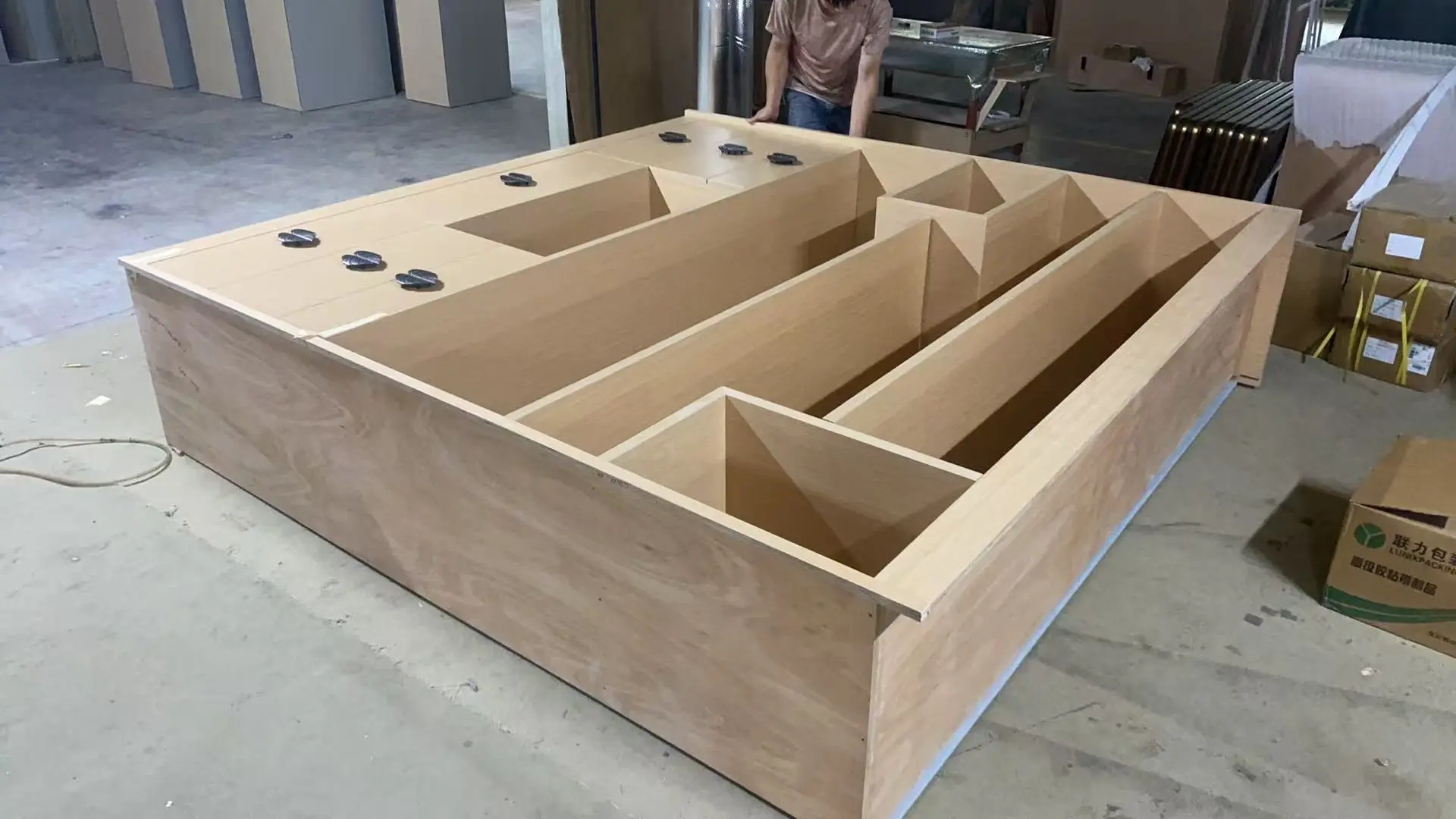 Millwork cabinet carcass under production showing precision construction and internal compartments