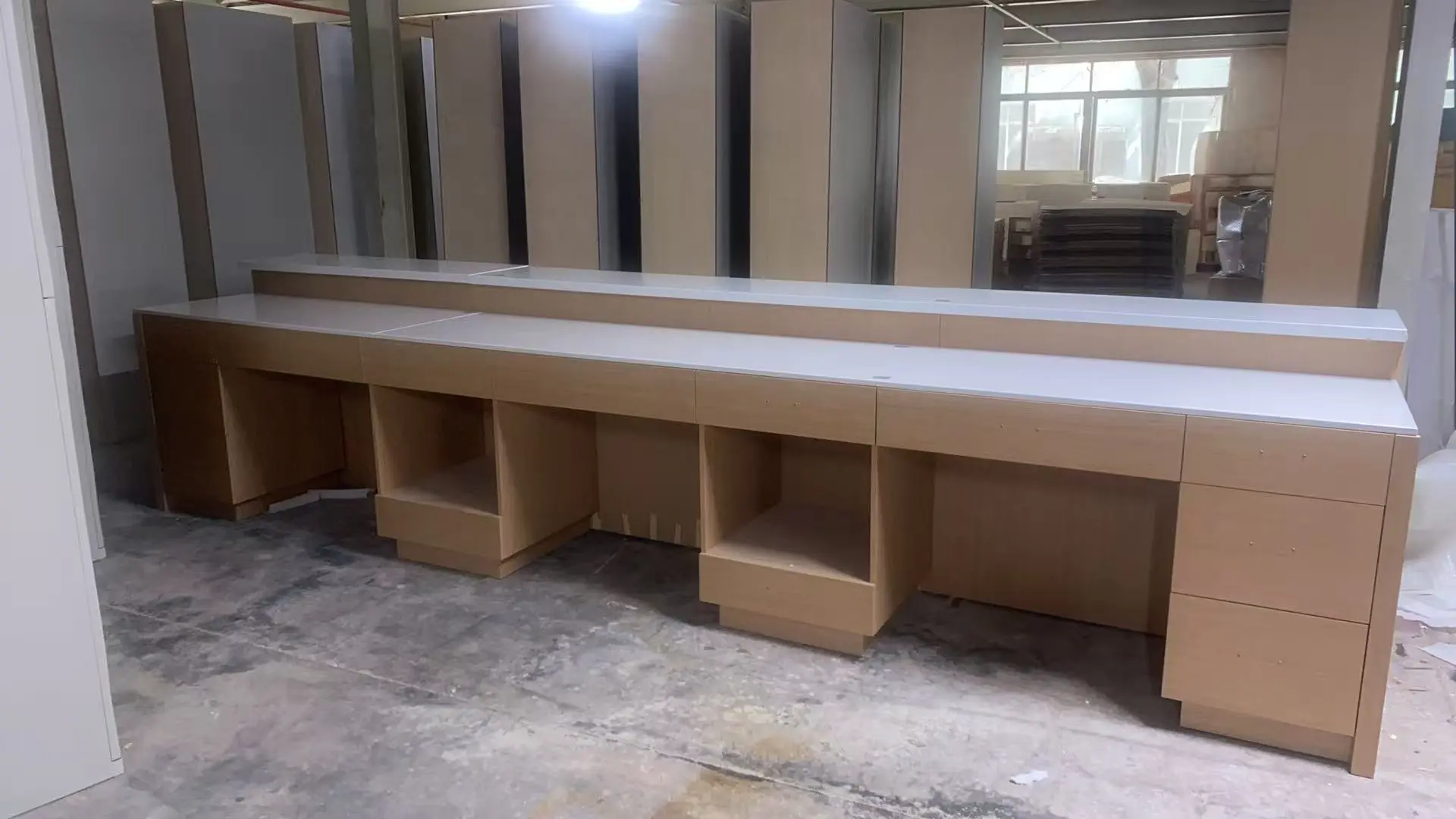 Custom millwork vanity cabinet under production showing precise assembly and structural compartments