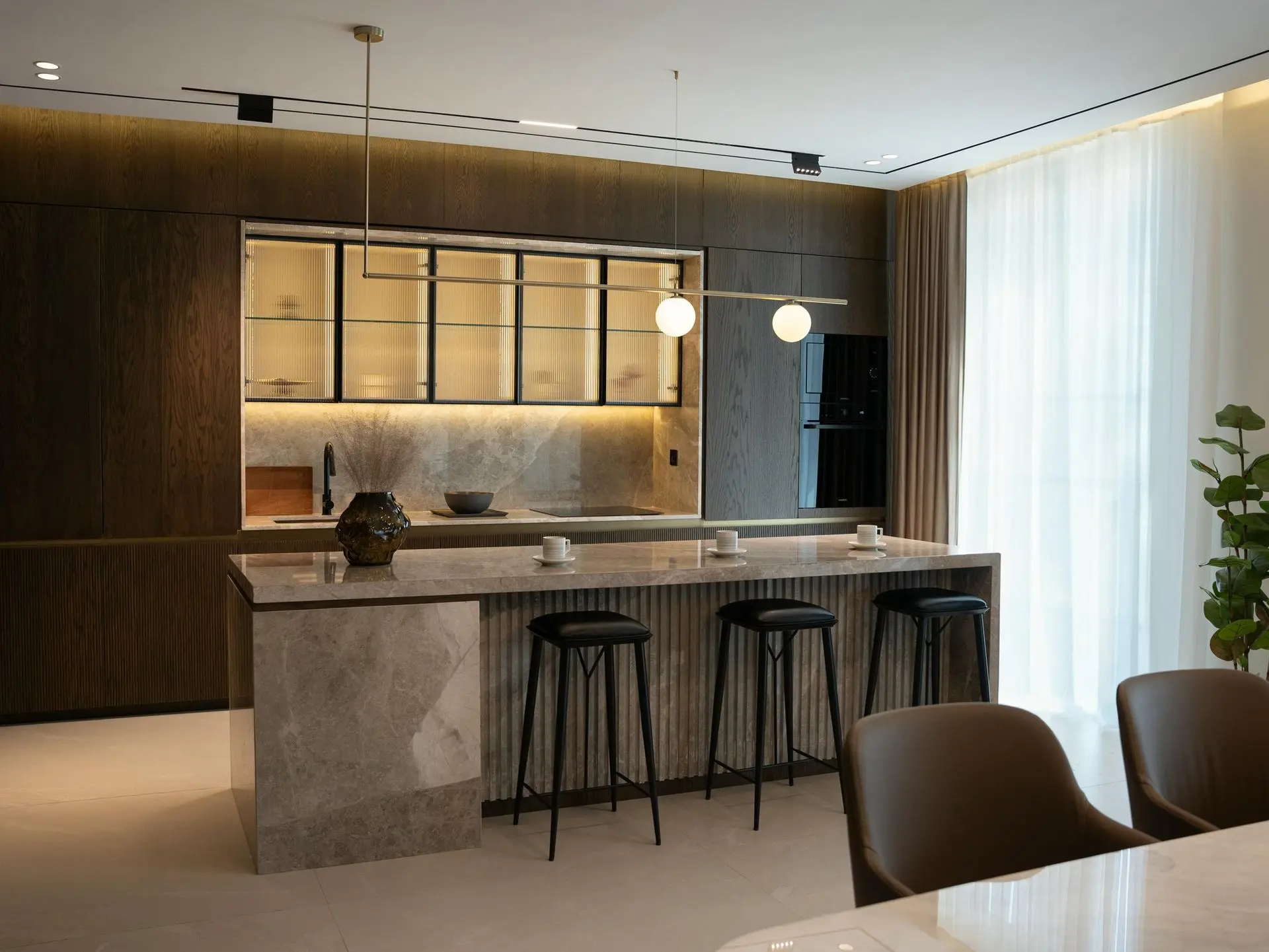 High-end millwork and furniture showcasing China’s manufacturing capabilities Luxury interior with custom millwork and cabinetry sourced from China