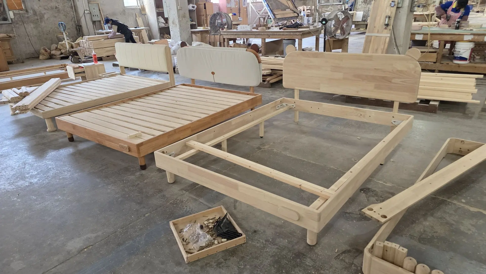 Sustainable furniture China factory producing wooden bed frames with large-scale manufacturing
