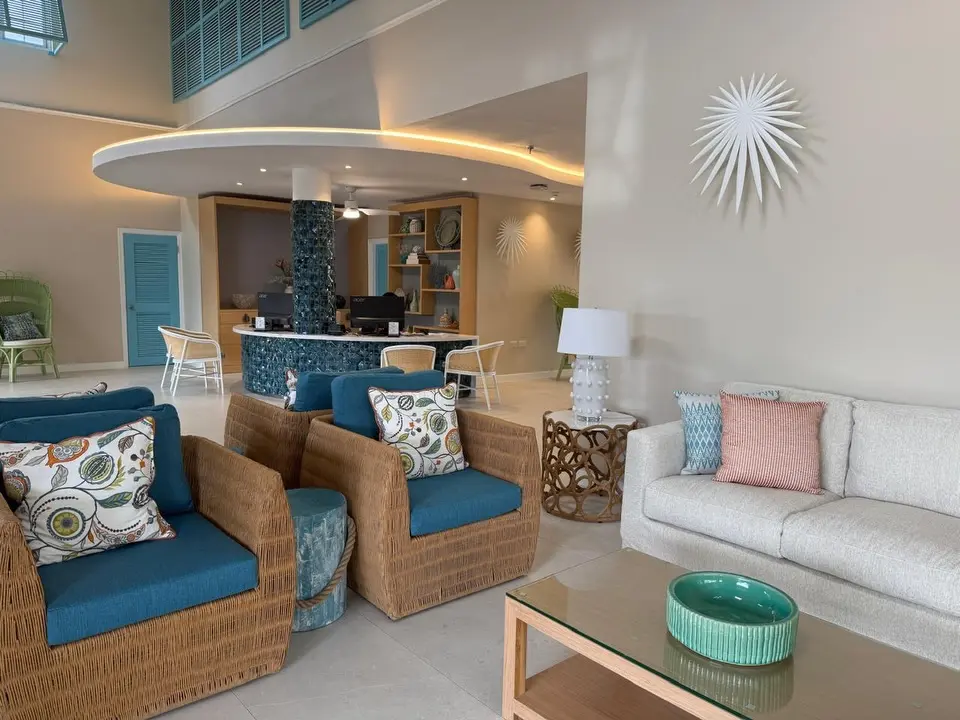 Hotel lobby furniture with reception desk, sofas, lounge chairs and coffee tables