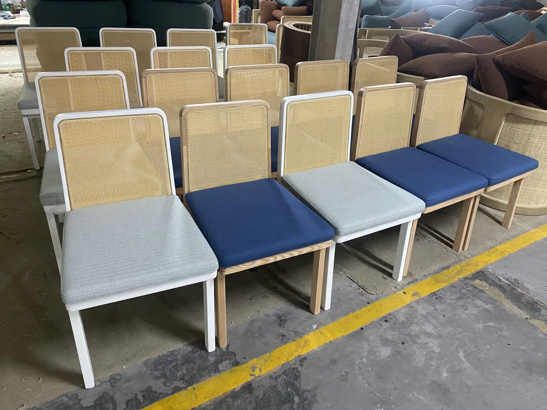 Hotel furniture sample chairs in factory with different finishes for approval and procurement process