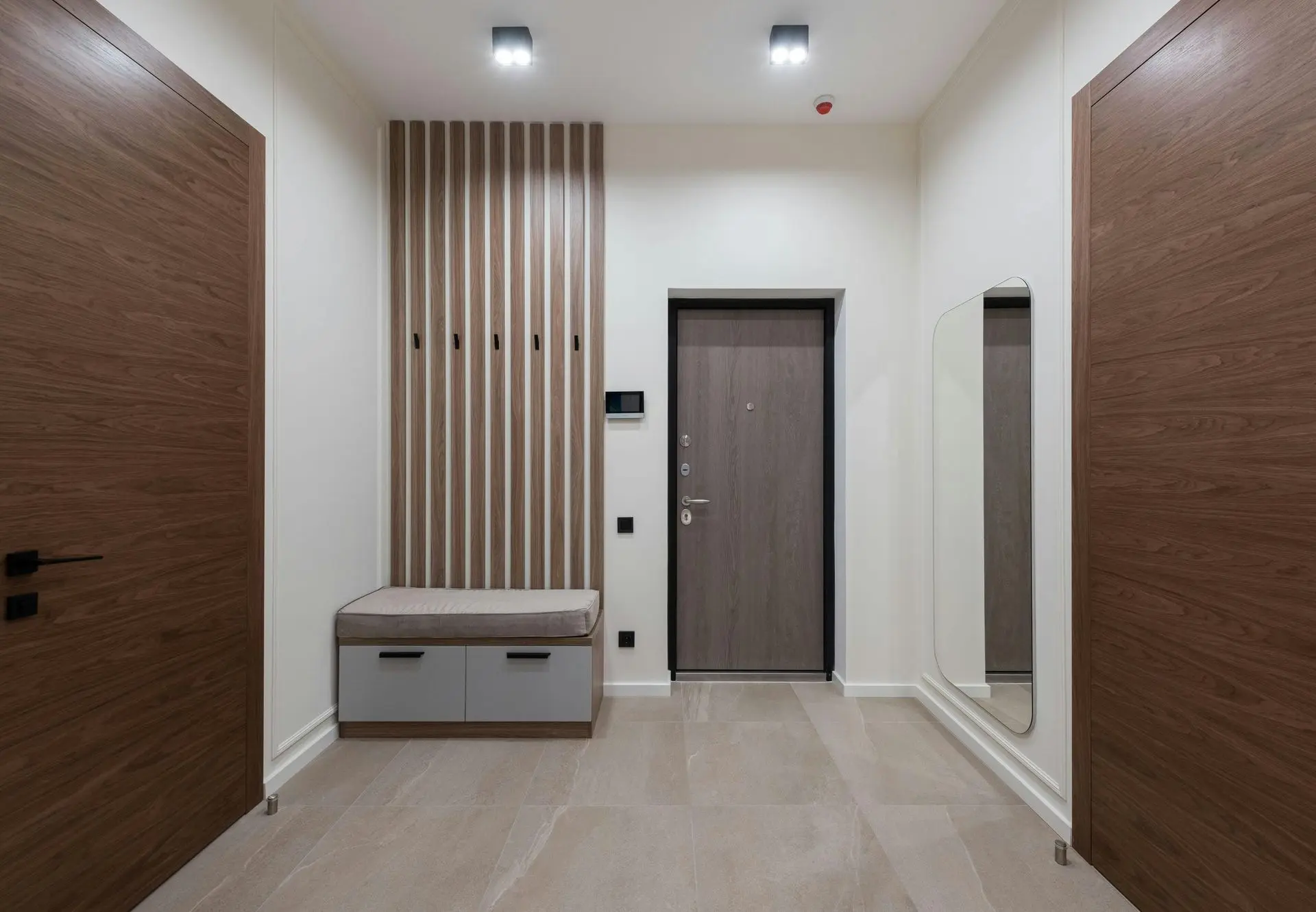 Modern Fire-Rated Millwork Interior with Wood Paneling and Doors Fire-rated millwork with modern wood wall panels and architectural door systems