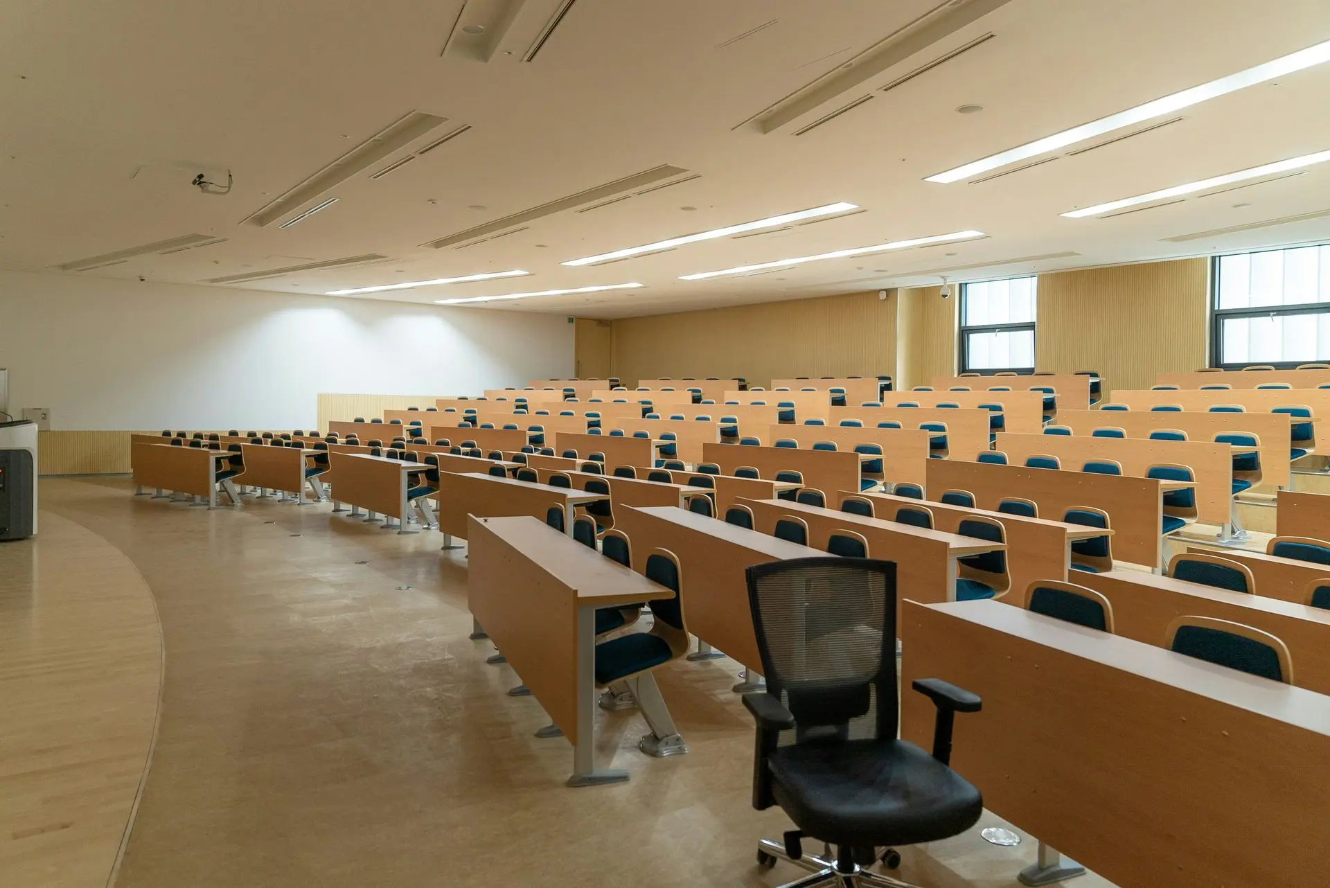 University Lecture Hall Featuring Fire-Rated Millwork and Code-Compliant Interior Design Educational facility lecture hall with commercial fire-rated millwork interiors