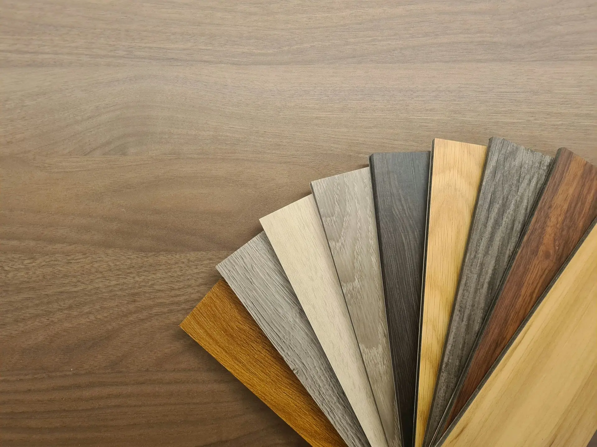 Commercial furniture finish samples displaying various woodgrain laminate and veneer options