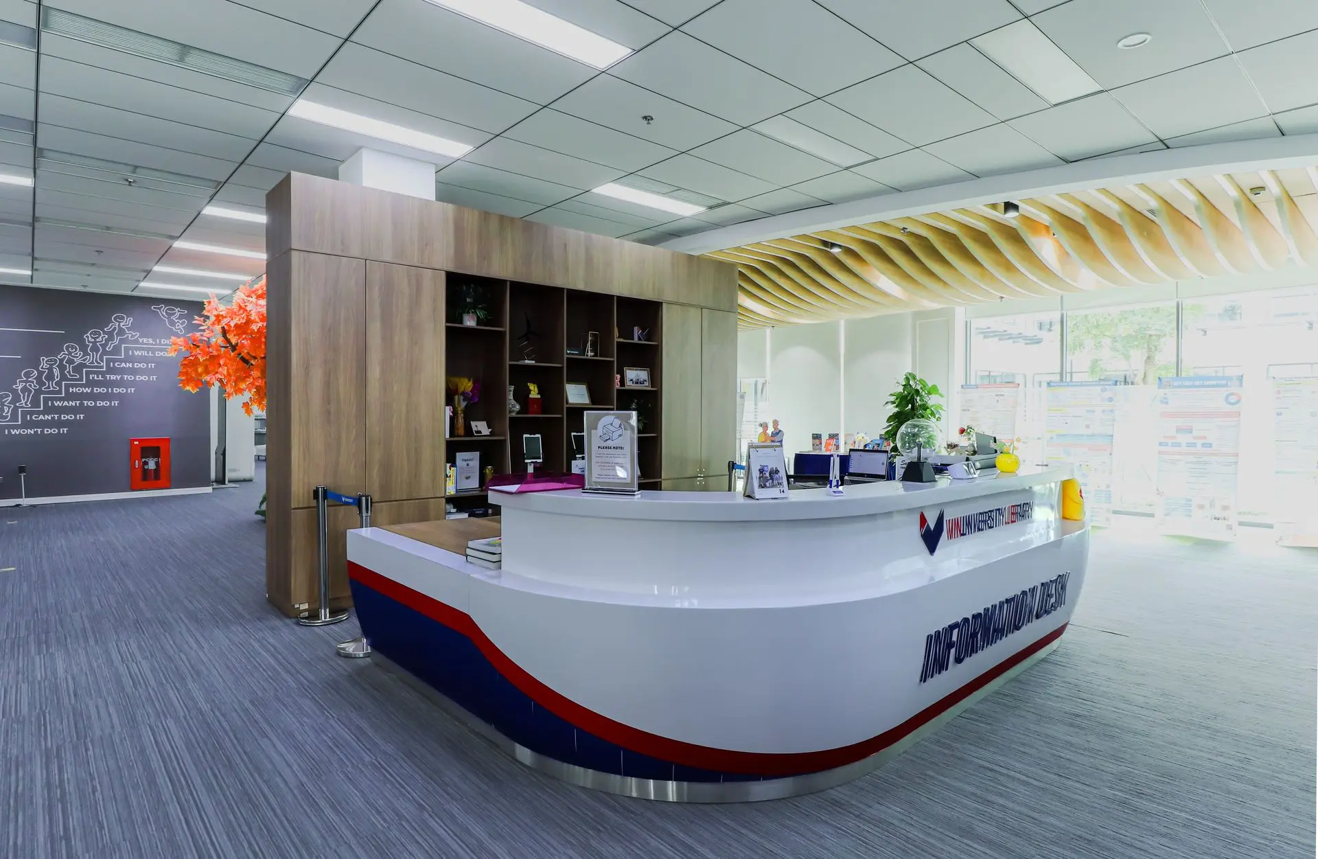 Curved Solid Surface Reception Desk Design for Commercial Spaces Modern curved solid surface reception counter with integrated branding and seamless finish