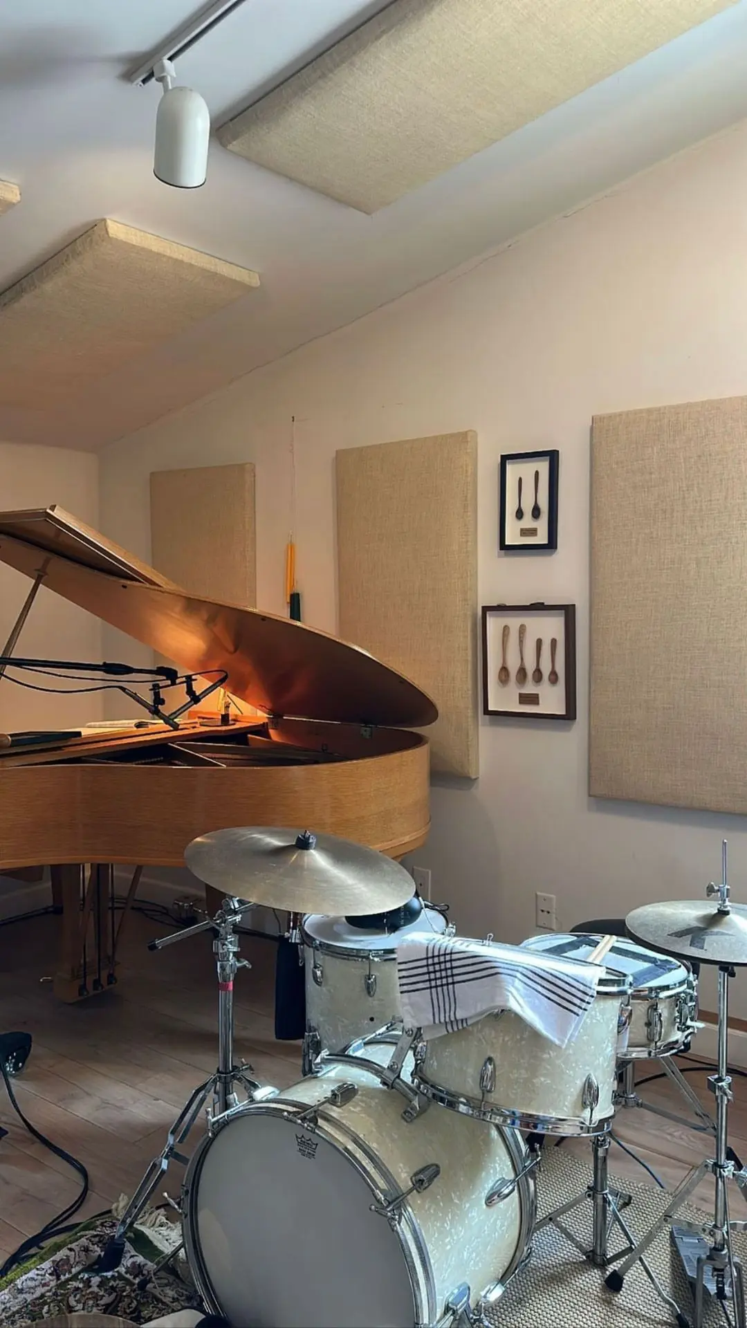 Fabric-Wrapped Acoustic Panels in a Recording Studio Fabric-wrapped acoustic wall panels and ceiling acoustic panels installed in a professional music studio for improved sound absorption.