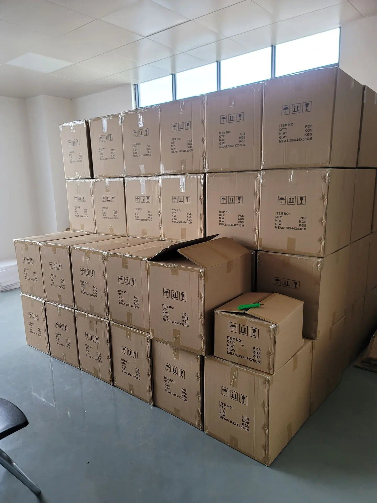 Furniture Export Packaging Process for International Shipping Furniture export packaging with labeled cartons on pallets prepared for international furniture shipping
