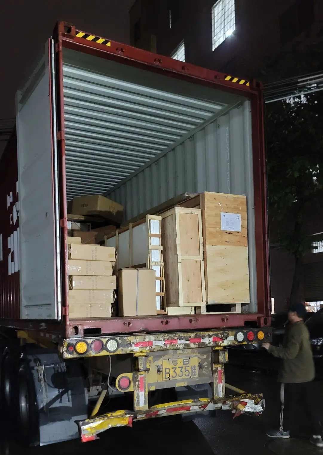 Furniture Export Packaging with Wooden Crates for Global Shipping Furniture export packaging with wooden crates and cartons loaded into a shipping container for international delivery