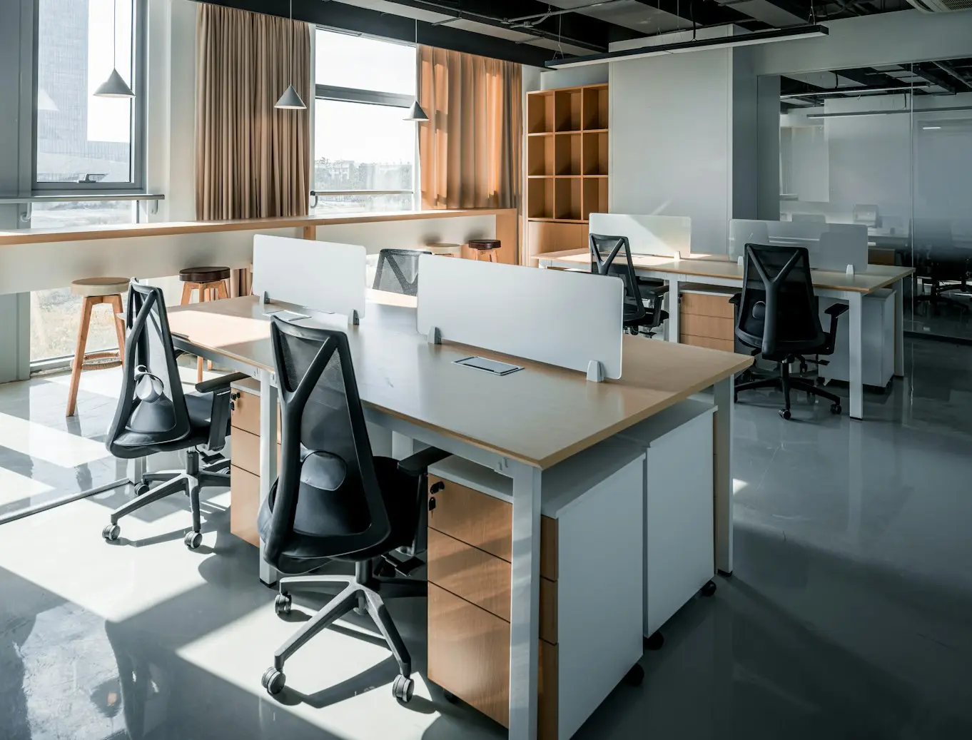 Modern office millwork and built-in cabinetry in a corporate workspace