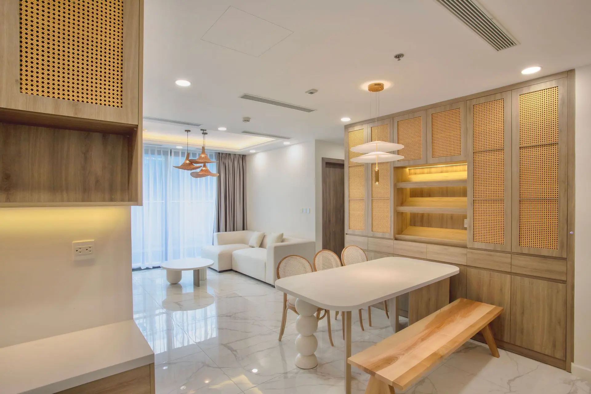 Custom Wooden Cabinetry for Modern Architectural Interiors Custom architectural millwork featuring built-in wooden cabinetry and decorative perforated panels