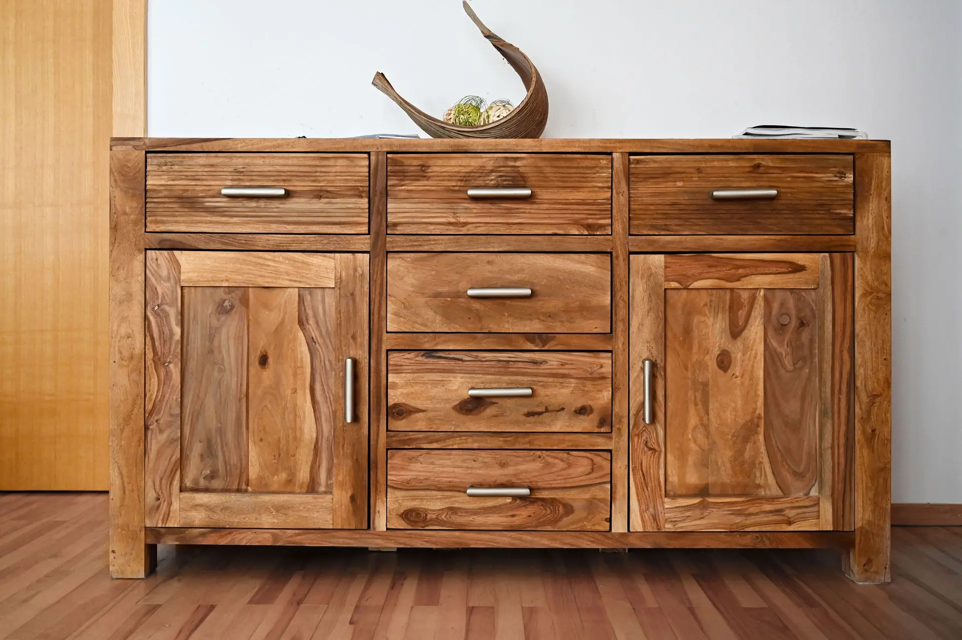 Solid Wood Furniture Finishes Solid wood sideboard showcasing natural wood grain and color variations